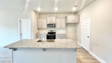 Photos are of a previous build. Colors and finishes may vary.