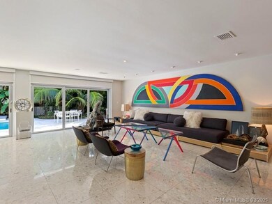 Large Living Room with Impact Doors Throughout. El