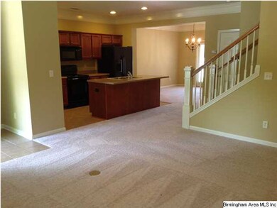 Open to living and dining.