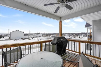 Covered deck with ceiling fan backing to trail
