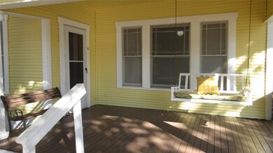Front porch featuring a porch swing