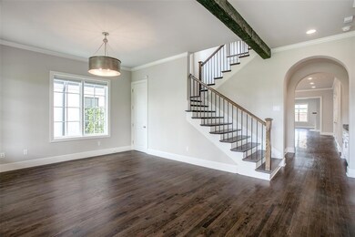 Versatile front room can be formal dining with nea