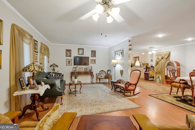 Open floor plan with laminate floors throughout