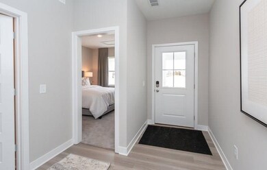 Photo is of a similar home or model.