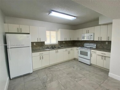 1650 W 44th Place unit 227, Hialeah, FL 33012 - photo 2