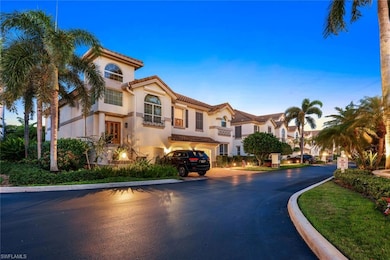 View of asphalt road featuring curbs