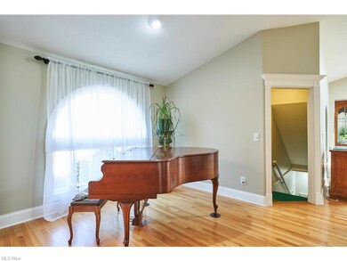The music room is to the left of the foyer with ha