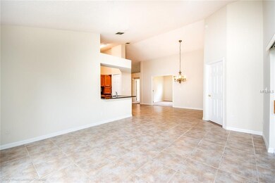 Living Area with Ceramic Tile and Vaulted Ceiling