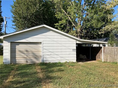 Garage / Large Workshop and Carport