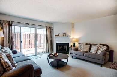 Living room with corner fireplace