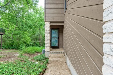 Doorway to property with central AC