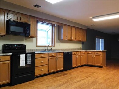 The Kitchen features spacious countertops with man