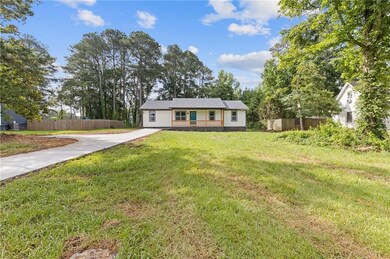 View of front of house featuring driveway
