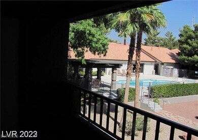 Balcony with view of pool area