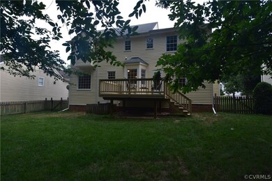 Fully fenced backyard and lots of grass!