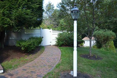 Easy side entrance to the pool side from yard.