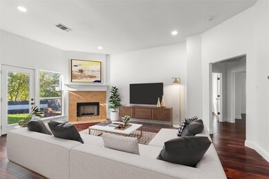 Virtually staged Living room with a fireplace and 