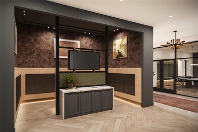 Resident mail and package area located near the 24-hour concierge. Features secure, temperature-controlled package storage with contemporary finishes that complement the main lobby design.