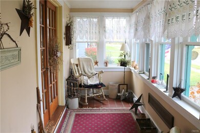 This enclosed porch welcomes you into the 349 apar