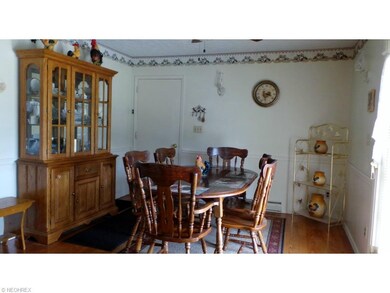 Dining room boasting beautiful hard wood floors