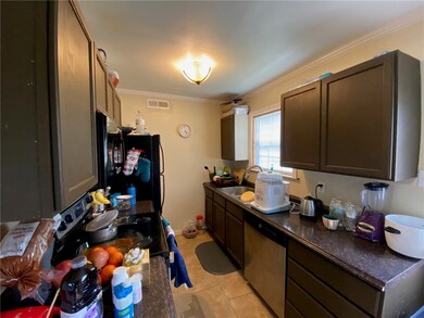 Kitchen featuring appliances with stainless steel