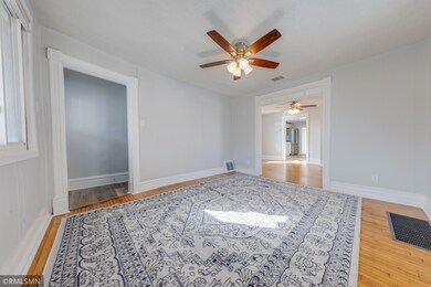Living room has refinished HW floors