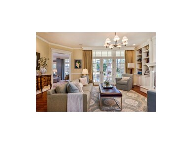 Transom windows and French doors galore!