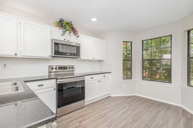 Kitchen featuring light hardwood / wood-style floo