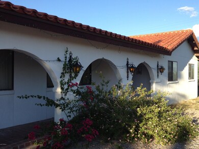 Covered front porch and back patio.