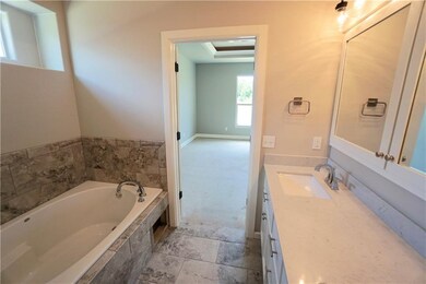 ONE CAN RELAX IN THE SOAKING TUB LONG AFTER THE SUN GOES DOWN.  THERE ARE TWO SINKS.