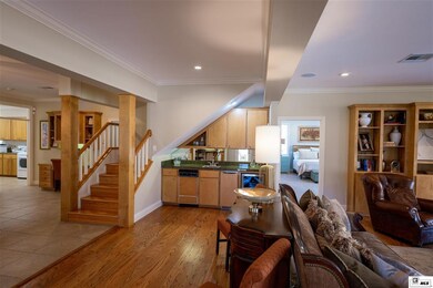 Wet bar includes dishwasher, sonic ice machine and