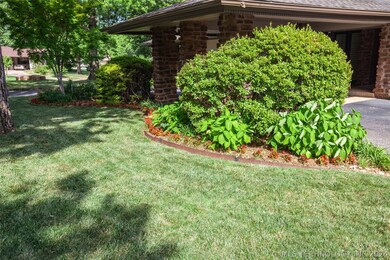 Professionally landscaped front yard.