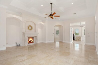Family Room with inviting gas fireplace enjoys eas
