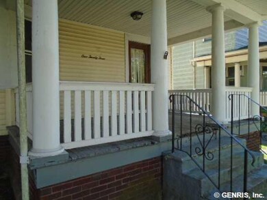 Exterior Front Inviting front porch! Just add rock