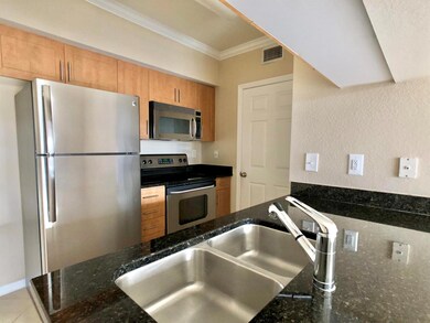 6466 Emerald Dunes Dr unit 203, West Palm Beach, FL 33411 - photo 2