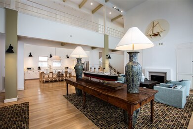 The home features open concept living and kitchen