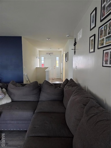 Living room featuring wood finished floors