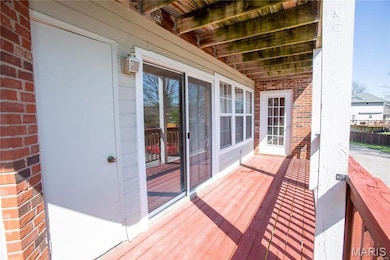 View of wooden balcony featuring a wooden deck