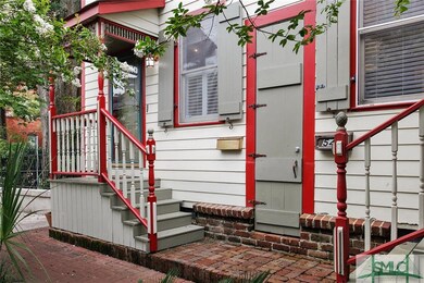 Storage room between buildings for bicycles and ot