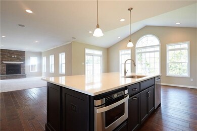 Kitchen island includes a large stainless steel si