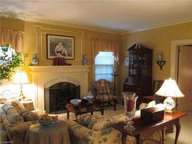 Living room - high ceilings and crown moldings.