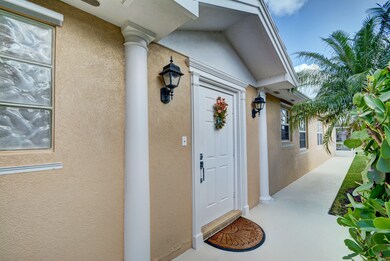 Front Door and Walkway to Back Yard