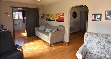 Living area with wood flooring throughout