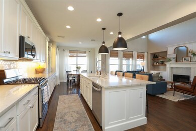 Quartzite Countertops! New cabinets! Updated light fixtures! Updated Stainless Appliances! Gas Stove top!