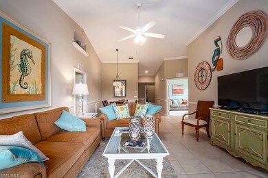 Living, Dining, Entry, and Den with Double Doors