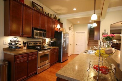The Gourmet Kitchen boasts Stainless Steel Appliances and LG Refrigerator! Fabulous Cabinets and a spacious two door pantry complete this Chef's Dream Kitchen!