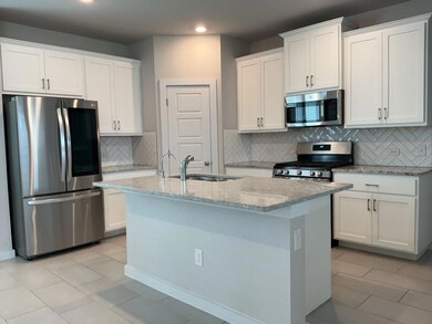 Kitchen featuring stainless steel appliances, rec