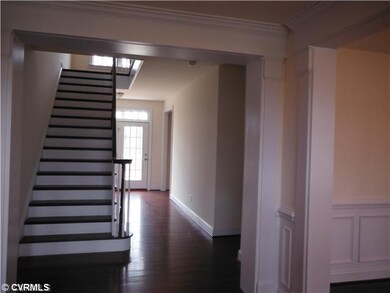 Foyer - Bright foyer leads through to rear French 