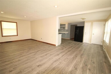 Family Room open to Kitchen w/New Flooring