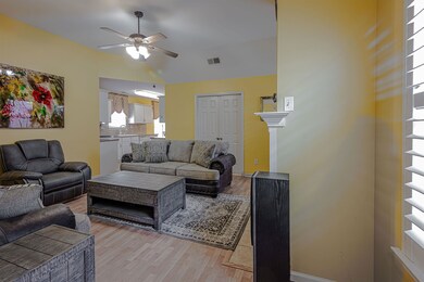 Living room featuring hardwood / wood-style floori